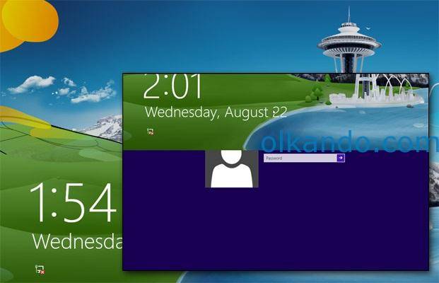 Windows kilit ekranının fotoğrafı. Saat ve tarih gösteren kilit ekranı yukarı kaydırılınca altından parola giriş kutusu çıkıyor.